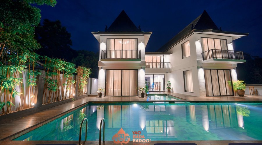 Two -level villa with large salt water pool.