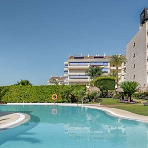 NH Marbella Hotel facilities swimming pool exterior day pool amp sunbeds
