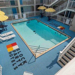 Outdoor Swimming Pool at Block Party Hotels presents Atlantic Oceanside (and Beach House Dewey) on the same block in downtown Dewey Beach, opposite the Bottle and Cork,  two blocks from The Starboard and 100 Steps from the Ocean.