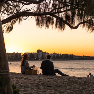 You'll love sunset at Mooloolaba Beach, just a short walk from your powered site. 