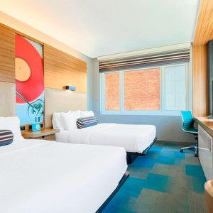 Queen/Queen Corner Guest Room