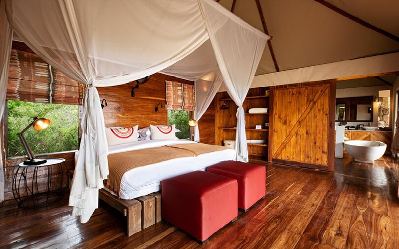 Sayari's double room set up with an ensuite bathroom. 