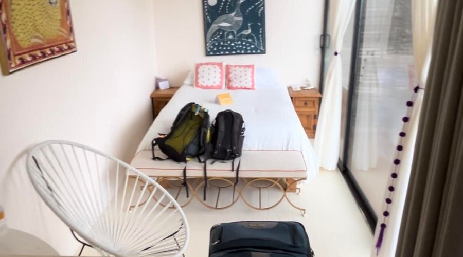 View of the inside of our room from one end (shower behind on the right and toilet behind on the left)