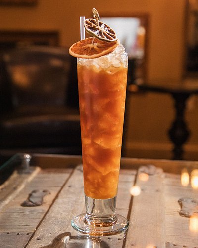 Orange cocktail in a large glass