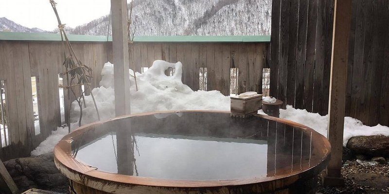 An outdoor hot spring bath at Jozankei Daiichi Hotel Suizantei.