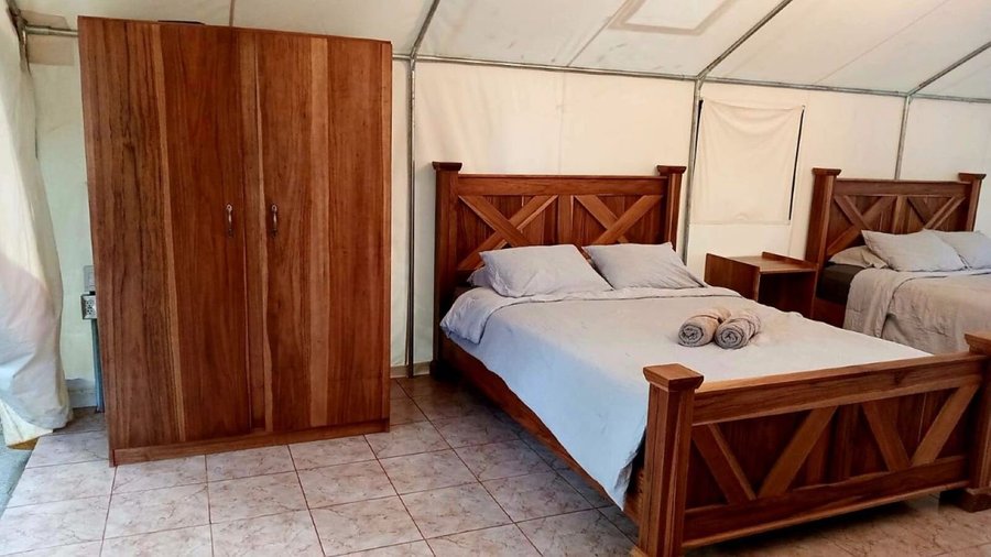 Two Hand-crafted Queen bed with clothing closet