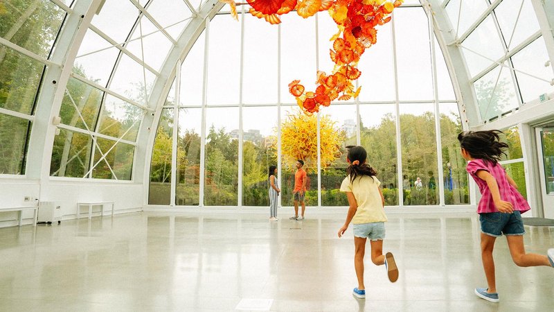 Family visiting Chihuly Garden and Glass, in Seattle