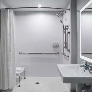 Accessibility features include large bathrooms and roll-in shower.