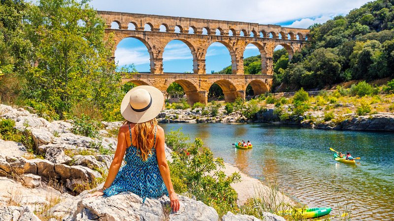 Woman looking at Pont du Gard, France