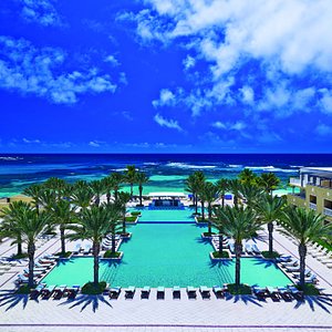Welcome to the exquisite JW Marriott St. Maarten Beach Resort & Spa, a luxurious haven of mindfulness, inspiration, and nourishment. Situated on the captivating Dawn Beach, our resort is a serene spa and island getaway, nestled amidst lush greenery and pristine white sandy beaches.