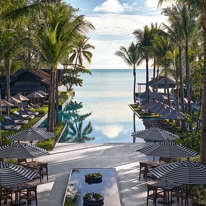 Resort beachfront view overlooking swimming pool and the Gulf of Thailand