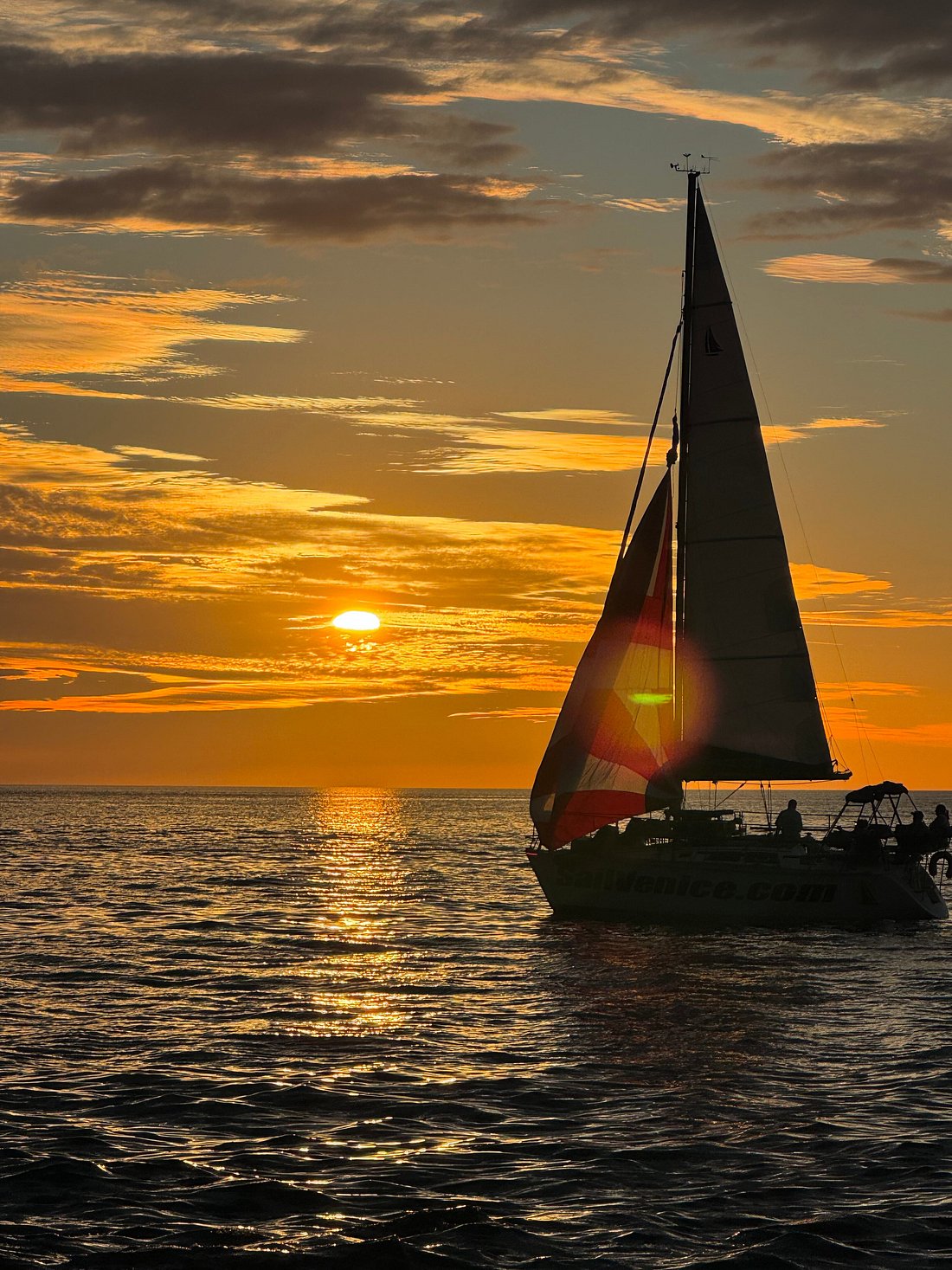 Sailboat and a Pink and Orange Sunset in Venice, Florida