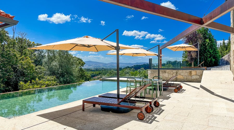 Villa Isobel is a renovated granite stone guest house set in the hills above Vila Verde north Portugal. Featuring spectacular views of the surrounding valley and easy walk to the forest above. Featuring suite type accommodation in a tranquil setting.