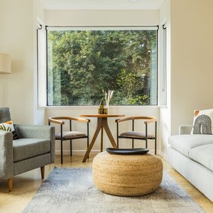 Enjoy spacious rooms in the Lodge building, including a wood-burning fireplace, sofa bed, seating area, and desk.