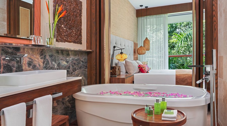 An expansive haven of your own, our one-bedroom suite features stylish living areas, the convenience of a fully equipped kitchenette, and beautiful jungle views, promising the comfort of home blended with unmatched luxury.