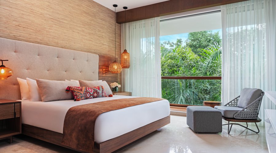 An expansive haven of your own, our one-bedroom suite features stylish living areas, the convenience of a fully equipped kitchenette, and beautiful jungle views, promising the comfort of home blended with unmatched luxury.