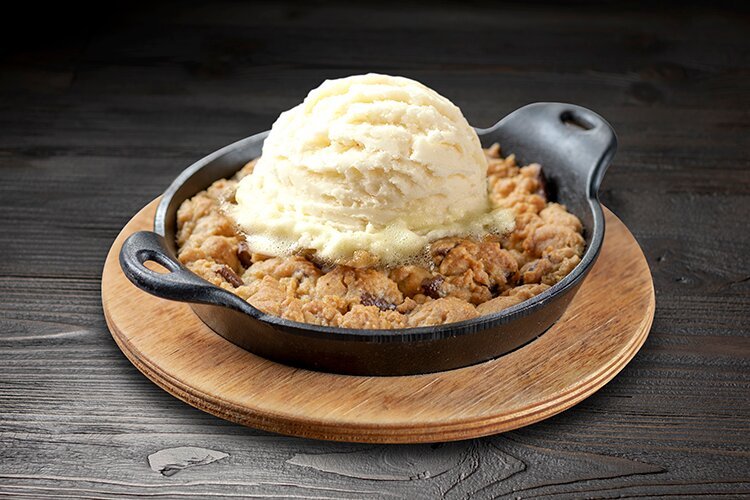 WARM CHOCOLATE CHIP COOKIE, Large fresh baked, warm chocolate chip cookie, topped with vanilla ice cream. Great for Sharing!