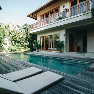 Experience the epitome of space and style at ZIN Berawa's 4-bedroom pool villa