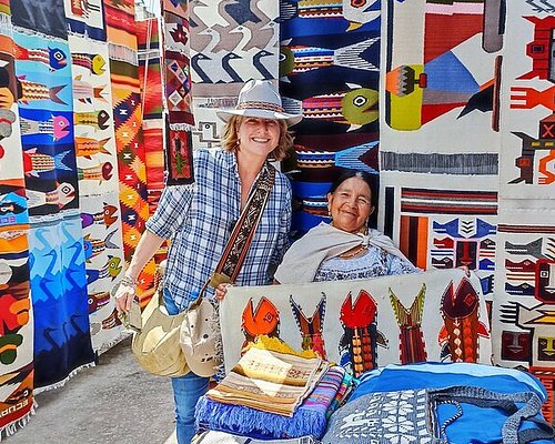 Magical Andes Photography  Young women shopping at stall selling
