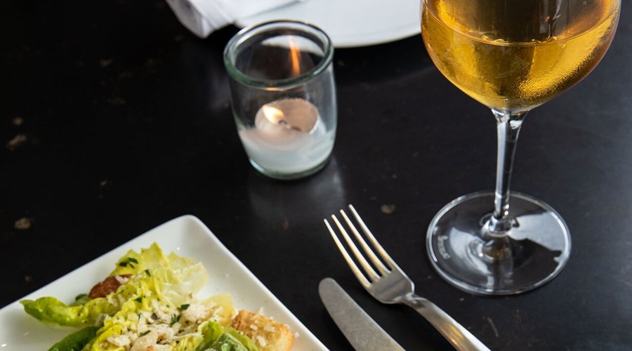 Salads and small plates with an assortment of wines from up the road and around the world