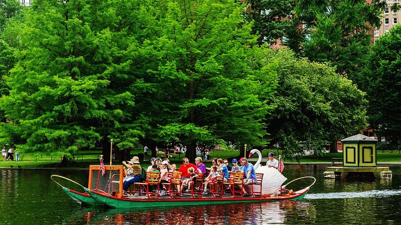 Families on swan boat, in Boston, Massachusetts