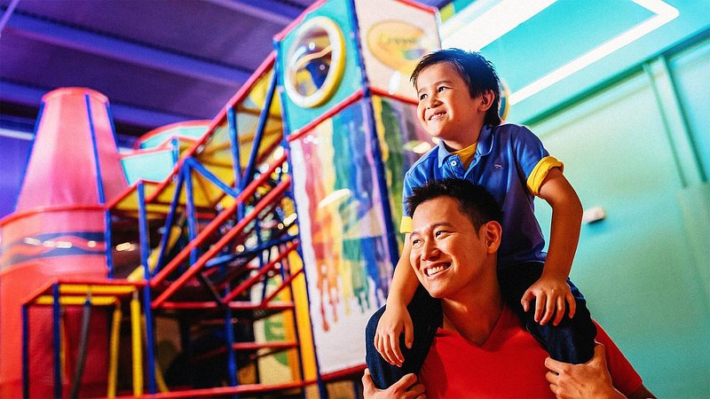 Father and son at the Crayola Experience, in Orlando, Florida 