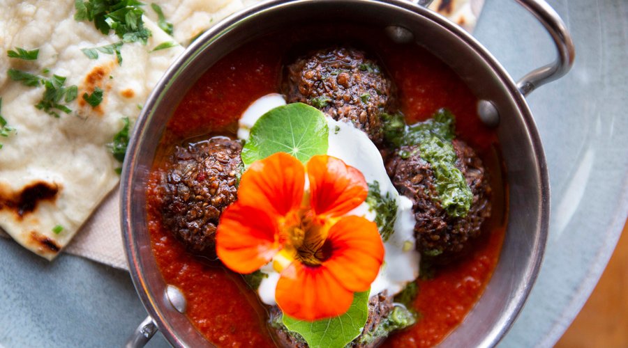 Kofta in rich tomato sauce, yogurt, herb oil and homemade flatbread