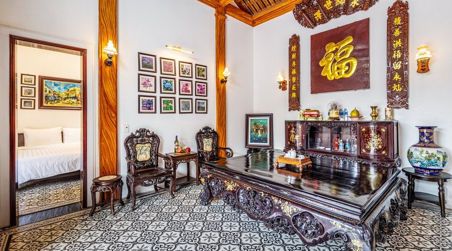 The Male landlord's room is connected to the living room