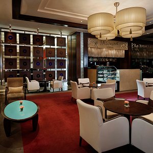 The hotel's stylish lobby buzzes with activity dawn till dusk