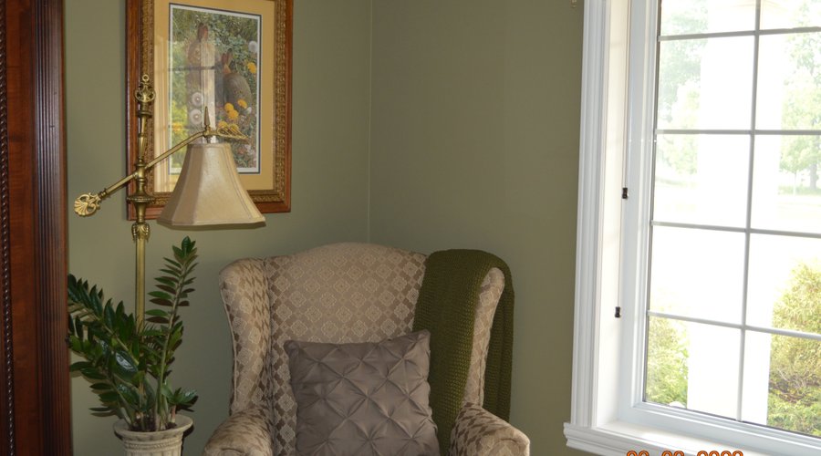 The Tranquility room has such a lovely reading chair with natural light. 