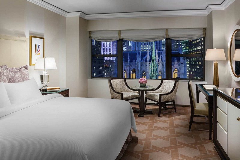  Lotte New York Palace guest room with a view of St. Patrick's Cathedral