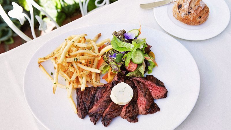 Steak frites and salad at Polo Lounge, Los Angeles