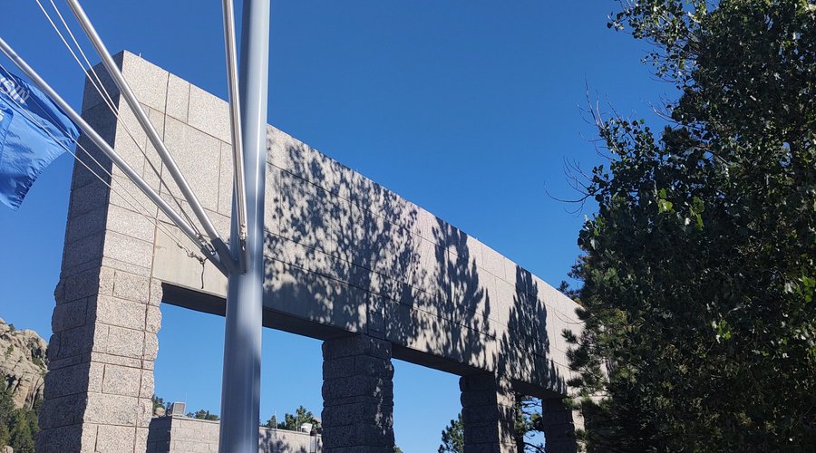 Com a bandeira do estado que mais visitei e mais gostei na viagem: Wyoming