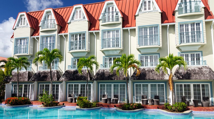 Coco Palm's Luxe Swim Up Rooms on the ground floor, Pool View rooms on the 2nd and 3rd floors and Pool View Suites on the top floor