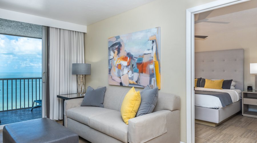 Each 700 sq.ft. recently updated suite features new furniture throughout, a living room with a queen-sized sleeper sofa, a separate bedroom with a king-sized bed, and a private bathroom with walk-in shower—plus granite surfaces and tile floors throughout. All suites also have a private lanai to enjoy the gorgeous views. Available in Gulf view, pool beach view, and beachfront view.