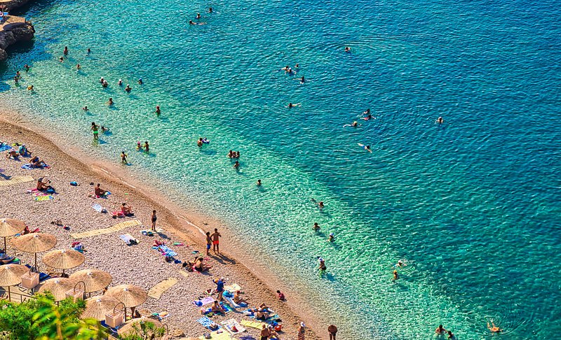 People at Arvanitia beach from high view