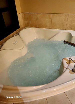 Jetted Tub was amazing! It is in the bathroom, but sliding window doors open to living room (by bed, very cool)
