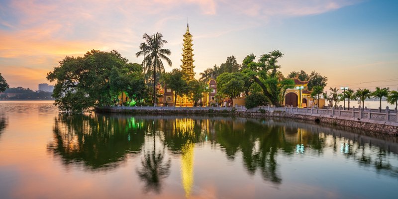 Panorama scene of Tran Quoc pagoda and lake with sunset