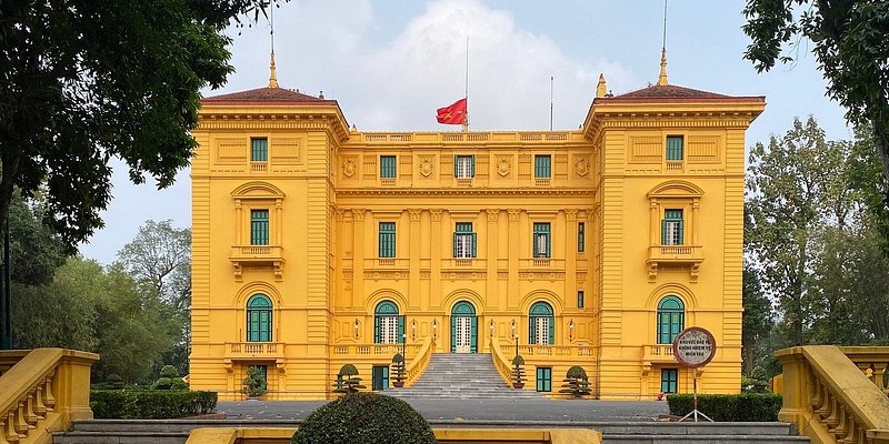 Exterior of multi-storied mustard-yellow palace