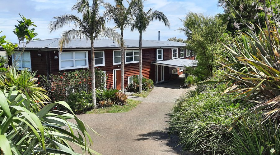 The Lodge with carport and parking for 5 to 6 cars