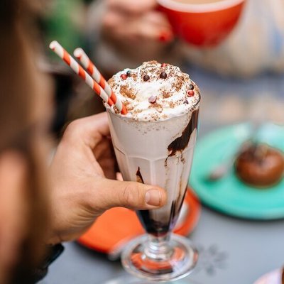 Milkshake with two striped straws
