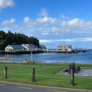 View of the small harbour in Oban, ferry coming in.