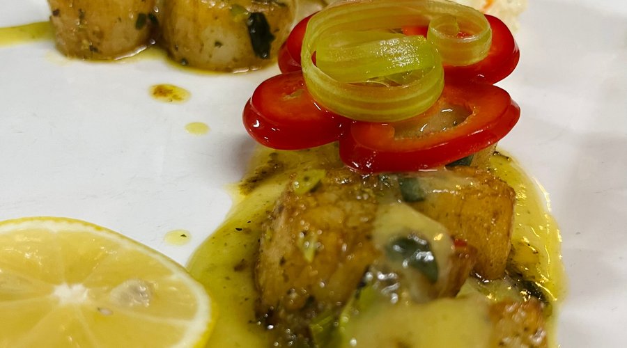 Our scallops are pan fried to perfection in a delicious, secret sauce.  
