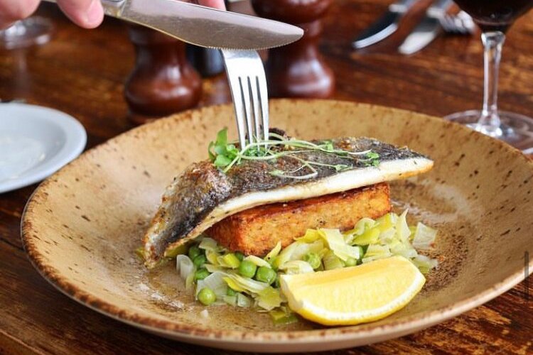 Fish of the day... Seabass fillet, crab & potato rosti, fricasse of leeks and peas