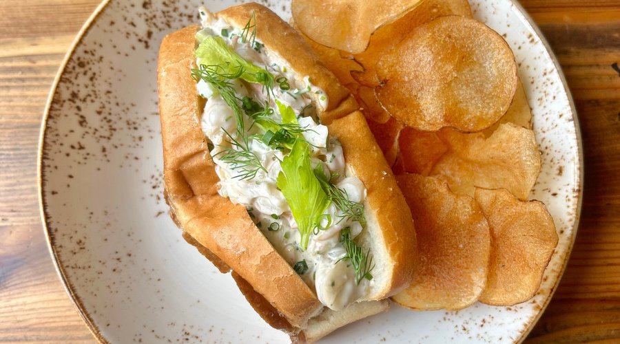 Smoked Shrimp Roll with greens, house-made chips 