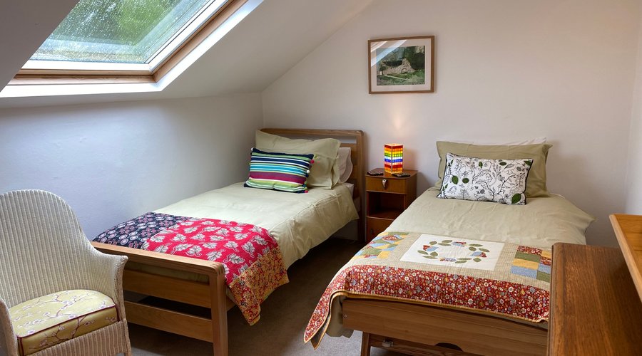Twin bedroom. We can put the beds together of guests prefer a king size bed