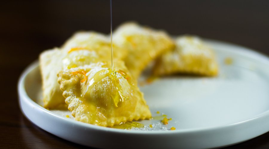 Ravioli artigianali di ricotta, zafferano e arancia