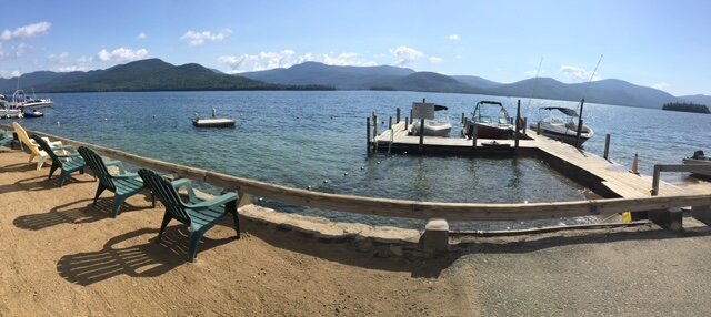 We have 300' of lakefront property for swimming, boating and fishing. Our beach front overlooks the swimming are, which is very shallow for young children and gradually gets deeper to the raft and beyond. Swim only in the designated swimming area.  
We have boat docking (extra charge), free use of rowboats, canoes, & kayaks, outdoor ping pong, swings overlooking the lake and more. 