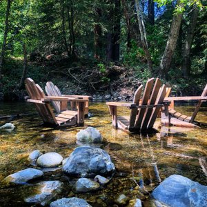 The place with the chairs in the river!