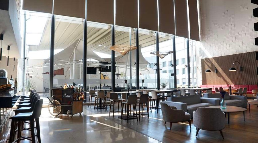 NH Collection Aeropuerto T Mexico Restaurant window natural light bar lasagrada
